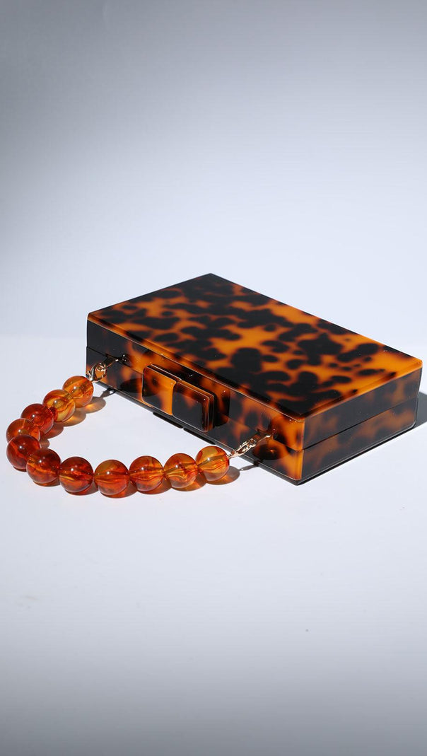 AIIZIE ACRYLIC BEADED CLUTCH IN AMBER - product image