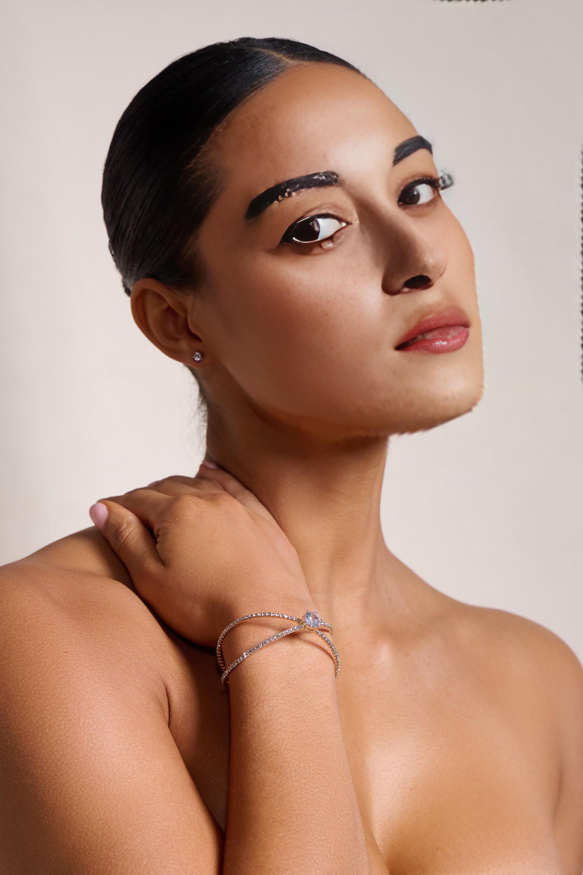 GOLDENES ARMBAND MIT DIAMANTANHÄNGER