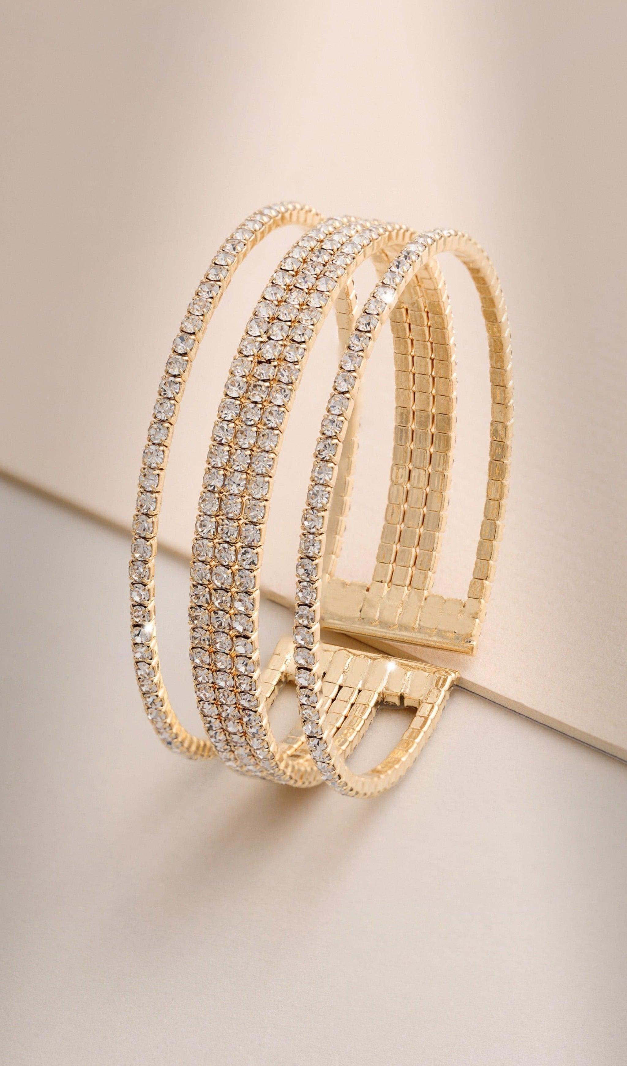 GOLDENES, MEHRLAGIGES DIAMANTENARMBAND