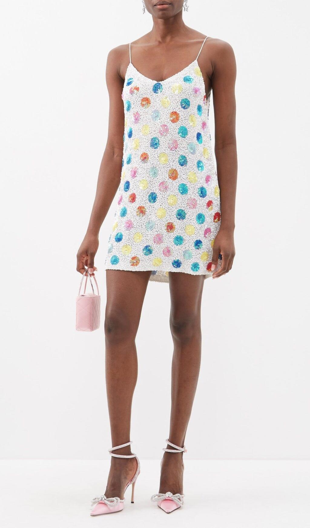 DÉCOLLETÉ CON FIOCCO E CRISTALLI IN RASO COLOR FUXIA