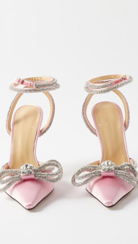 DÉCOLLETÉ CON FIOCCO E CRISTALLI IN RASO COLOR FUXIA