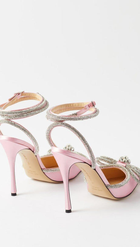 DÉCOLLETÉ CON FIOCCO E CRISTALLI IN RASO COLOR FUXIA