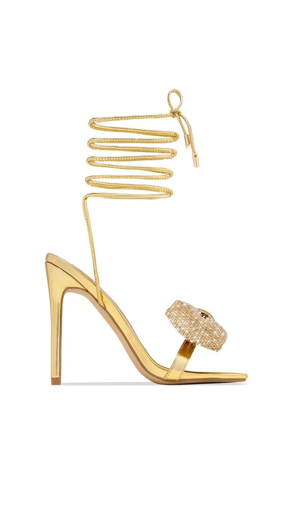AIIZIE GOLD CROSS-LACE RHINESTONE BOW HEELS - product image