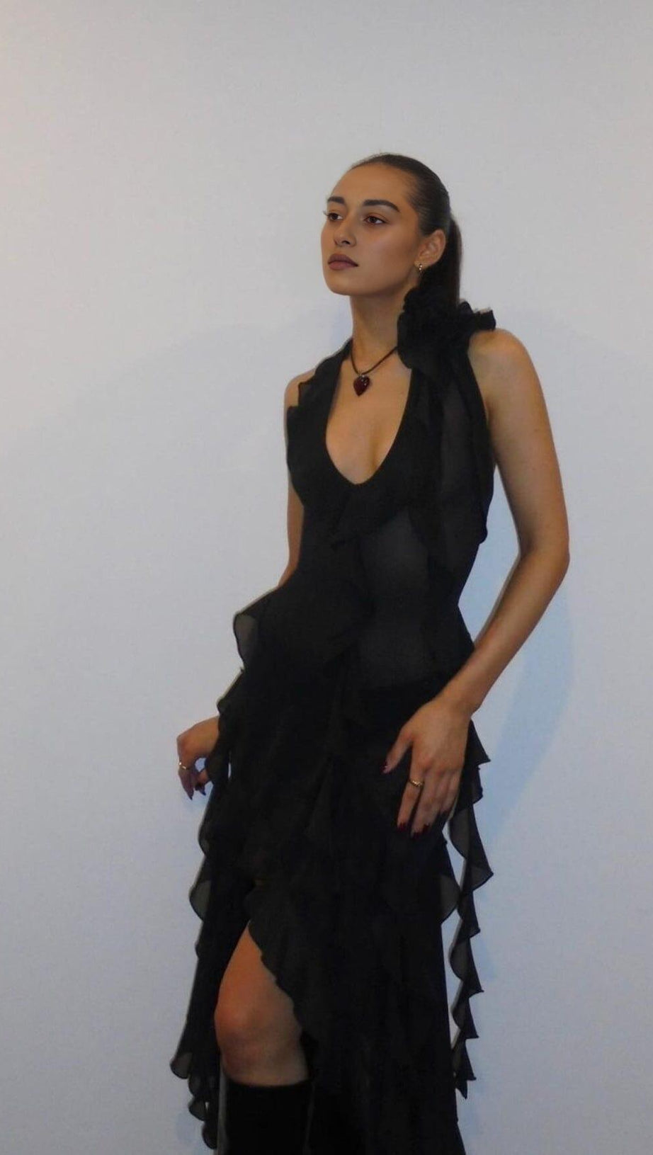 PLUNGING NECKLINE RUFFLE DRESS IN BLACK