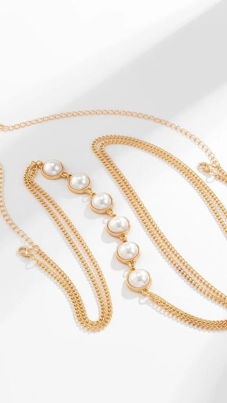 PEARL CROSSOVER CHEST BODY CHAIN IN GOLD