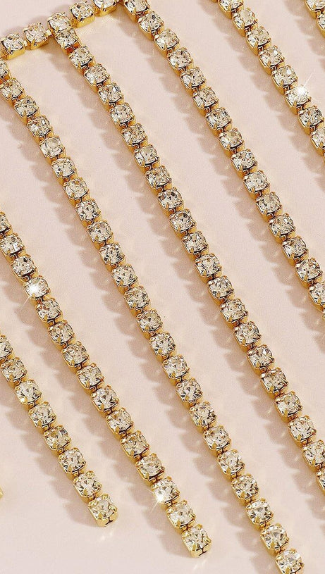 BRUSTKETTE MIT QUASTE UND DIAMANTEN IN GOLD