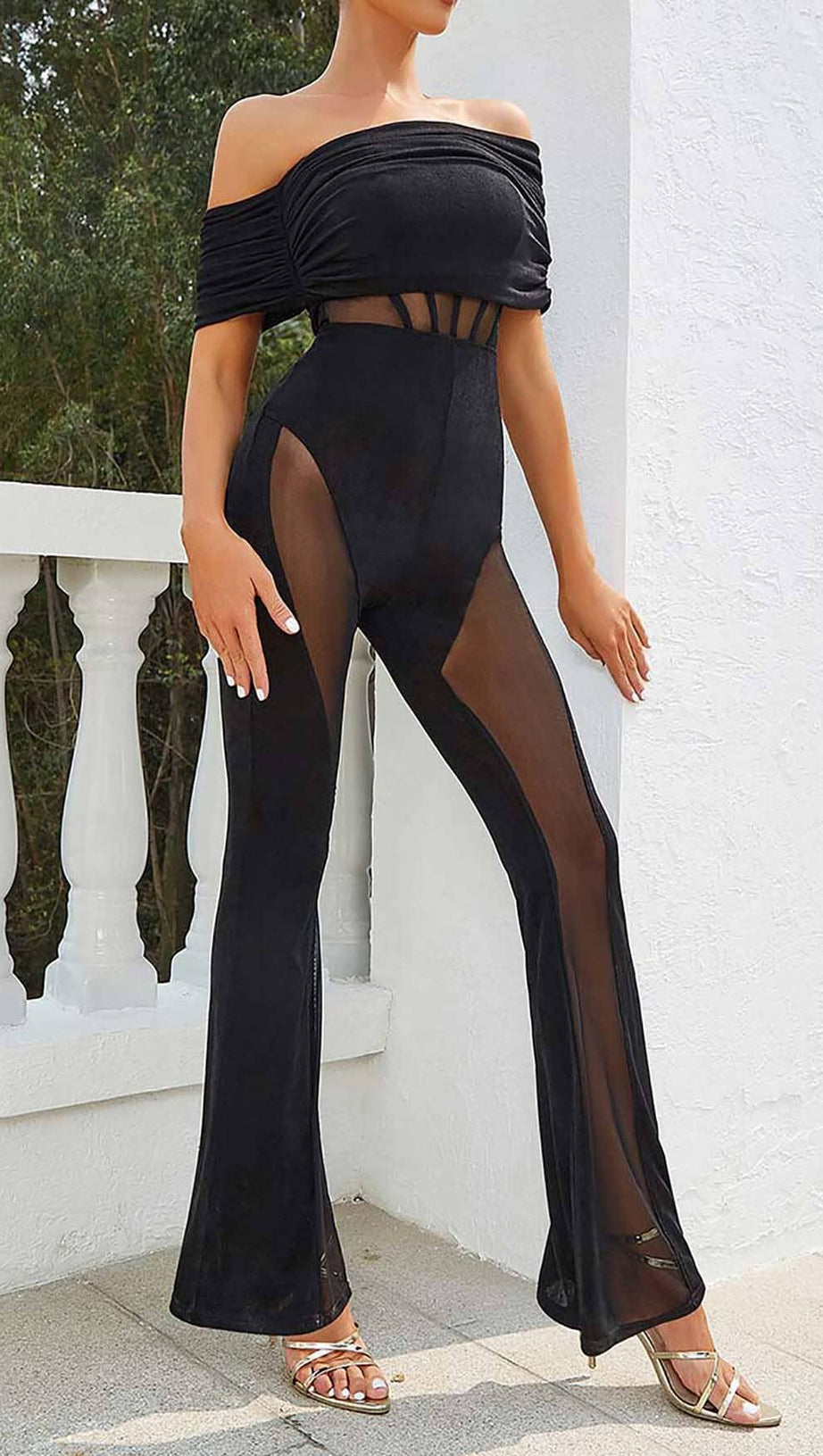OFF SHOULDER MESH JUMPSUIT IN BLACK