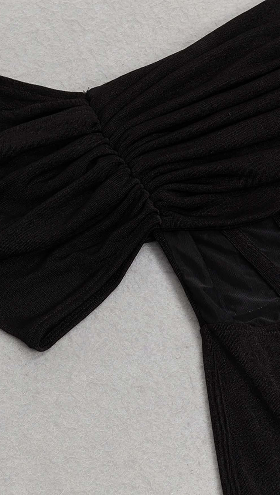 OFF SHOULDER MESH JUMPSUIT IN BLACK