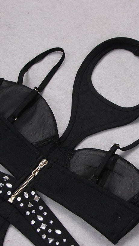 Ärmelloser Jumpsuit mit Pailletten und Cut-Outs in Schwarz