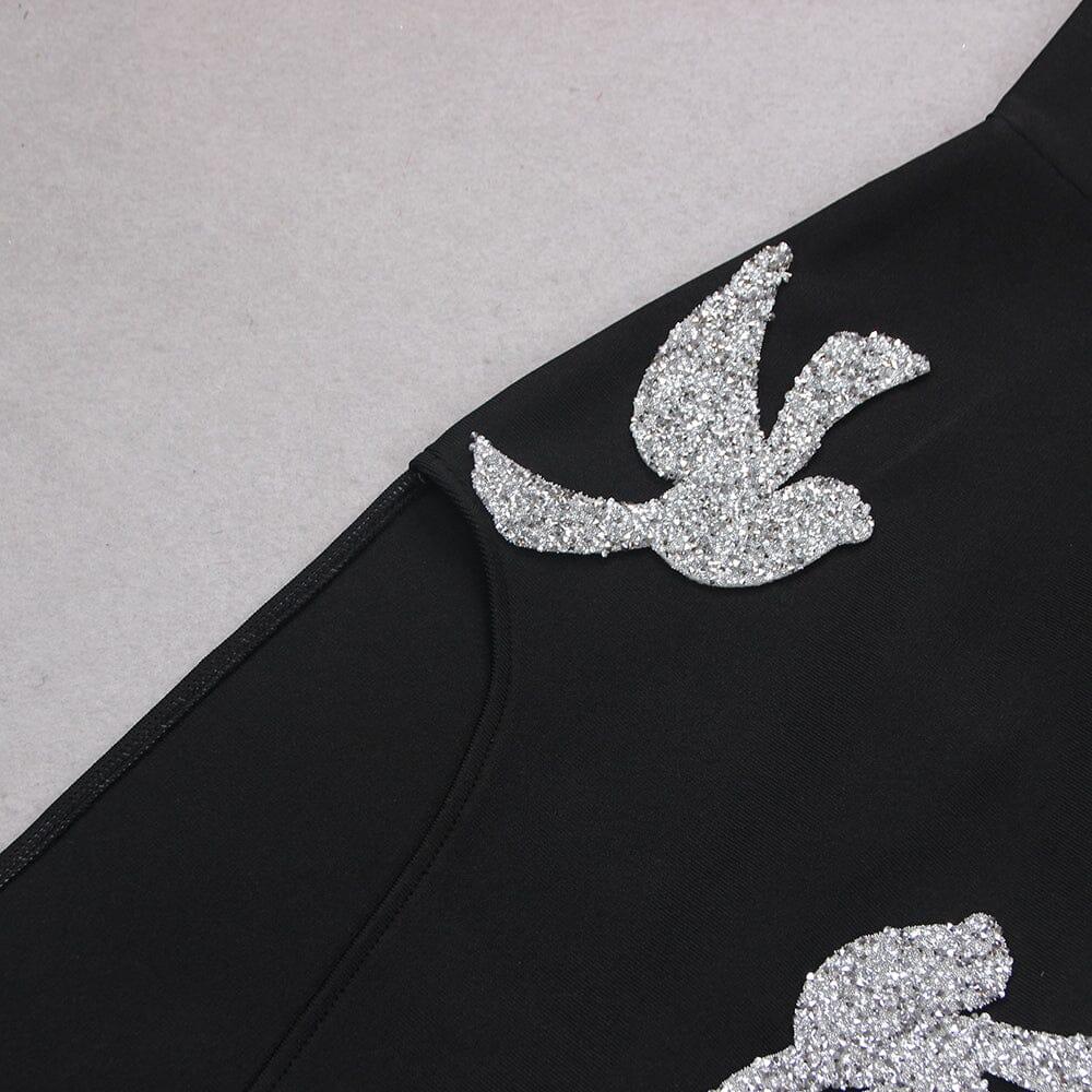 ABITO MIDI CON CORSETTO E PAILLETTES IN NERO