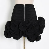 STRAPLESS FLOWER PLEATED SKIRT IN BLACK