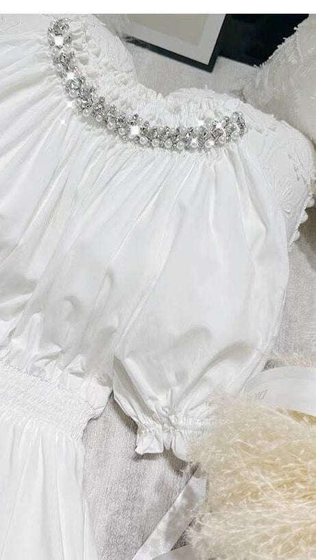 MINI ABITO CON MANICHE A SBUFFO E COLLO IN CRISTALLO