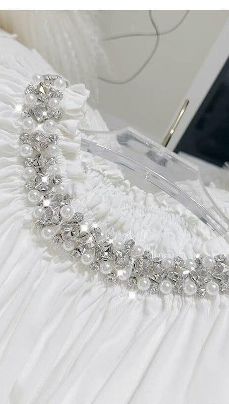 MINI ABITO CON MANICHE A SBUFFO E COLLO IN CRISTALLO