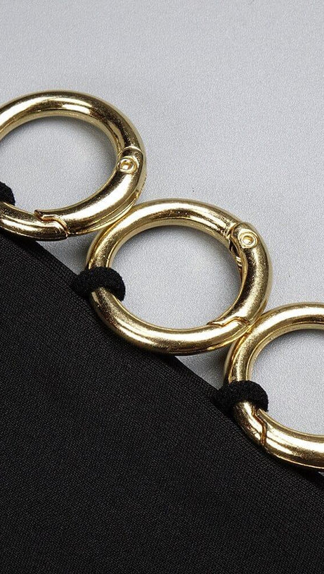 ABITO LUNGO A MANICHE LUNGHE CON DECORAZIONI IN NERO