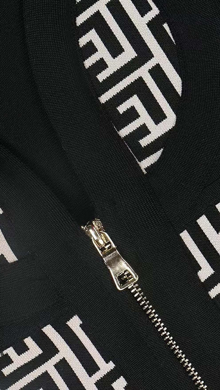 SHOULDER PADS KNITTED MINI DRESS IN BLACK