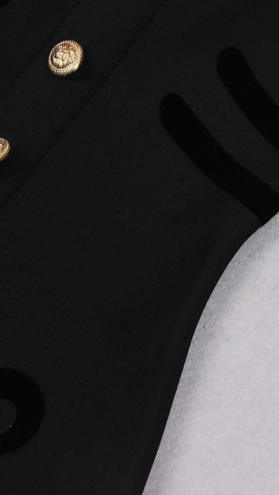 SCULPTURE BUTTON MINI DRESS IN BLACK