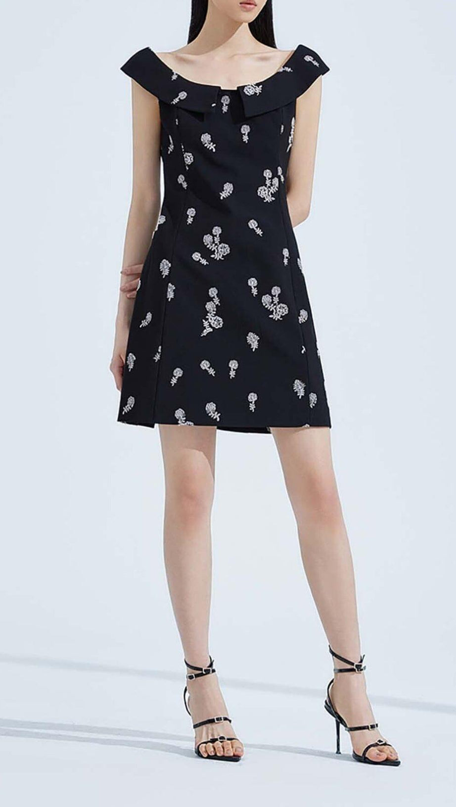 SLEEVELESS EMBROIDERED MINI DRESS IN BLACK