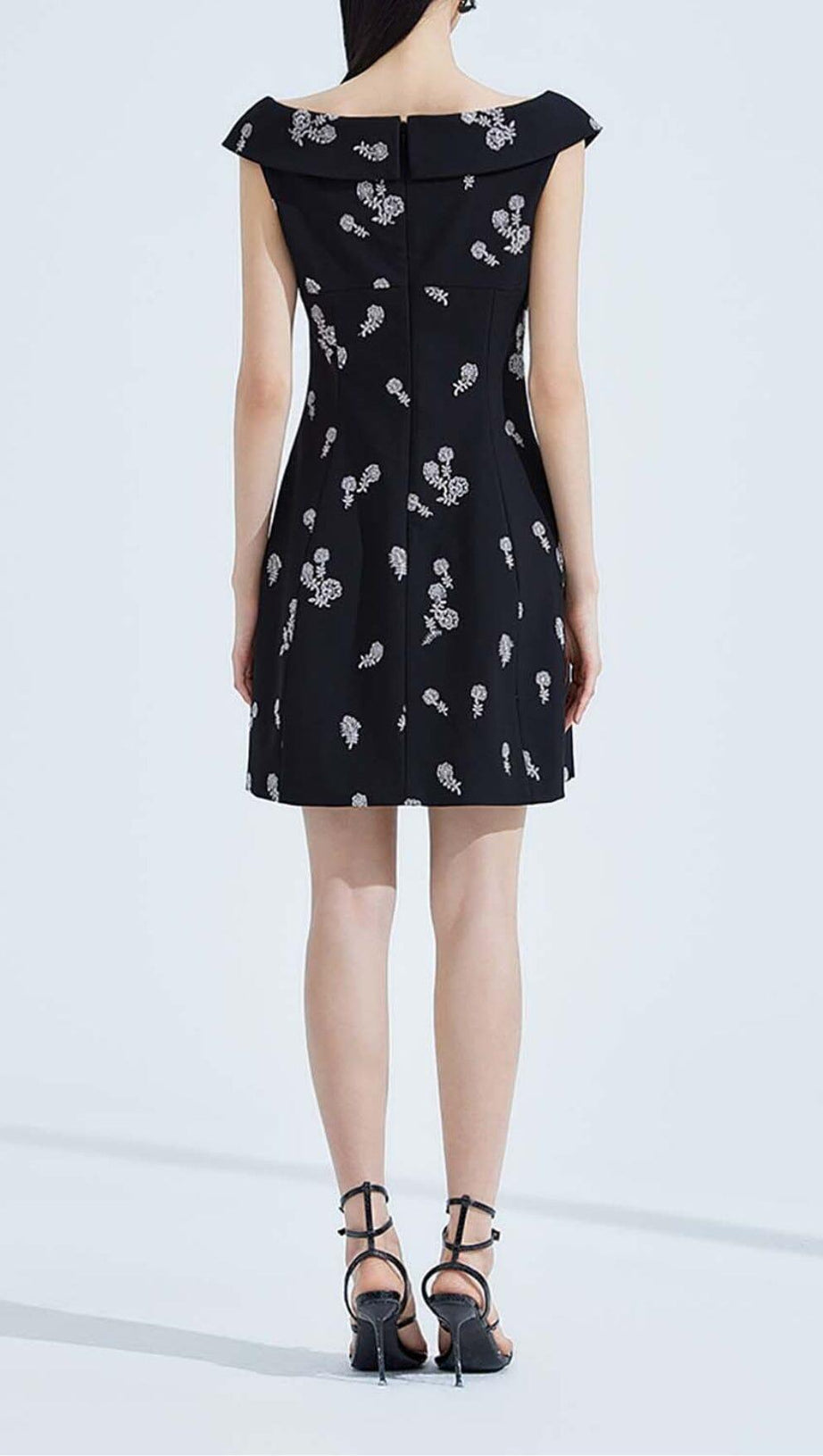 SLEEVELESS EMBROIDERED MINI DRESS IN BLACK