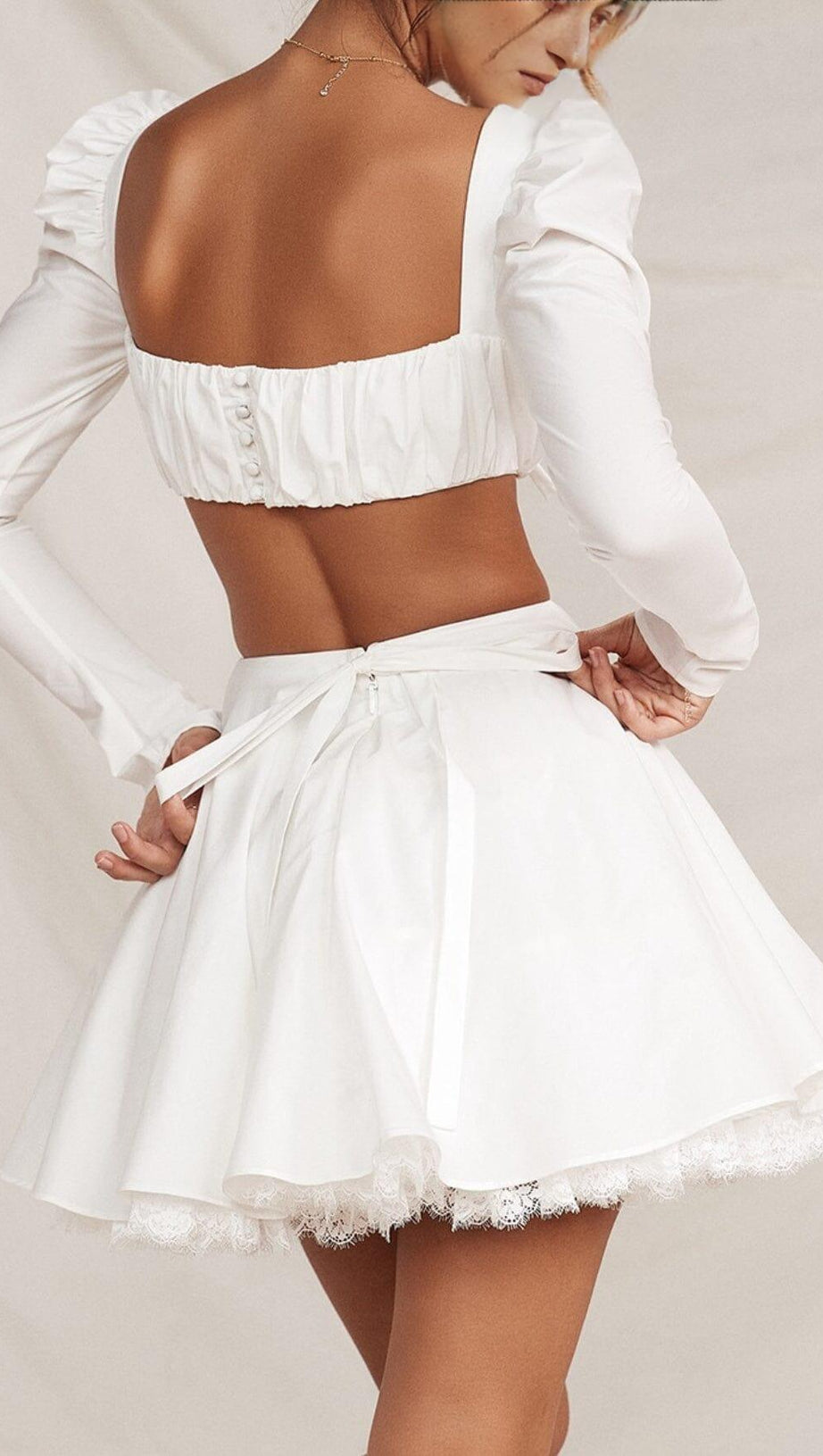 WHITE BOW MINI SKIRT