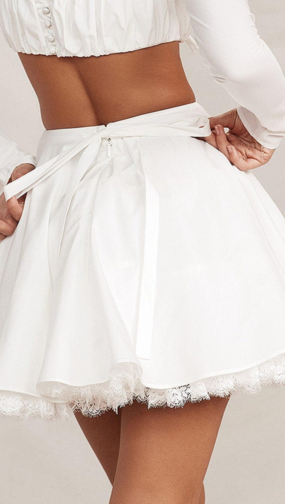WHITE BOW MINI SKIRT