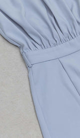 MOCK-NECK BELTED JUMPSUIT IN BLUE