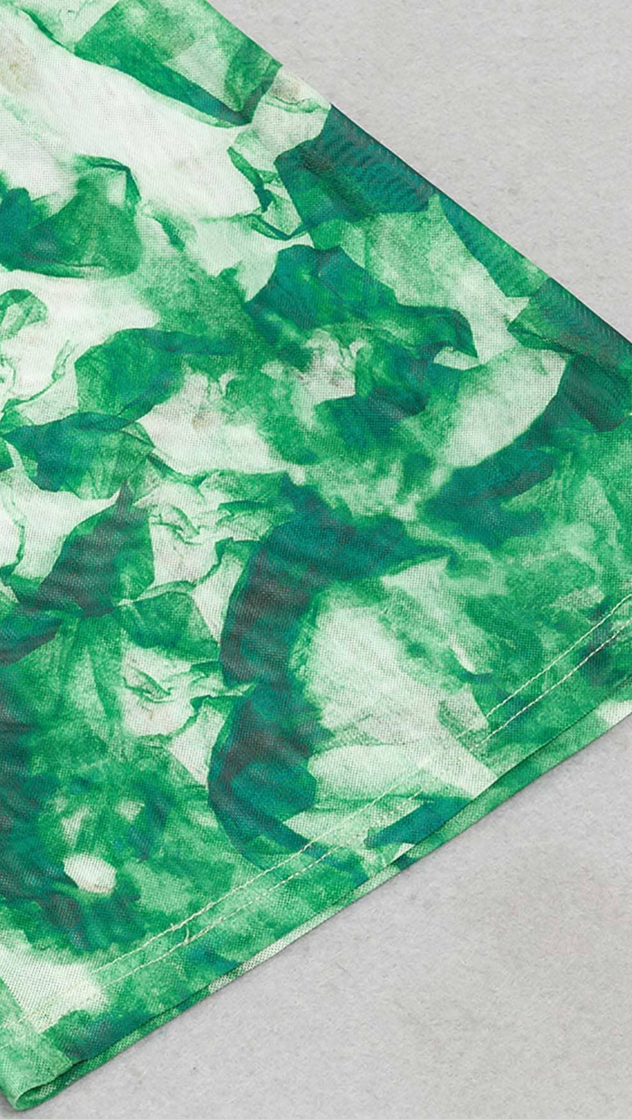 TIE FRONT HALTER NECK BACKLESS JUMPSUIT IN GREEN