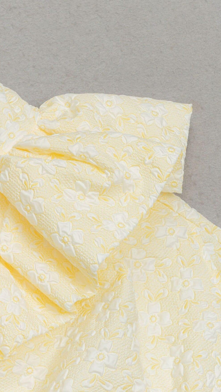 STRAPLESS RUFFLE MIDI DRESS IN IVORY