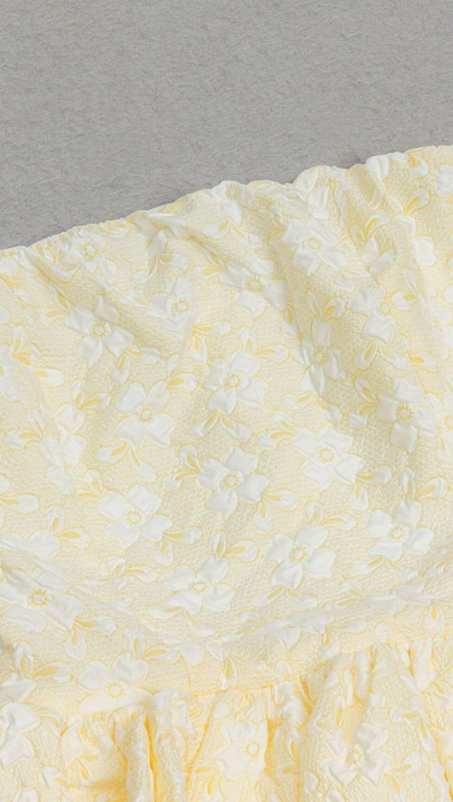 STRAPLESS RUFFLE MIDI DRESS IN IVORY