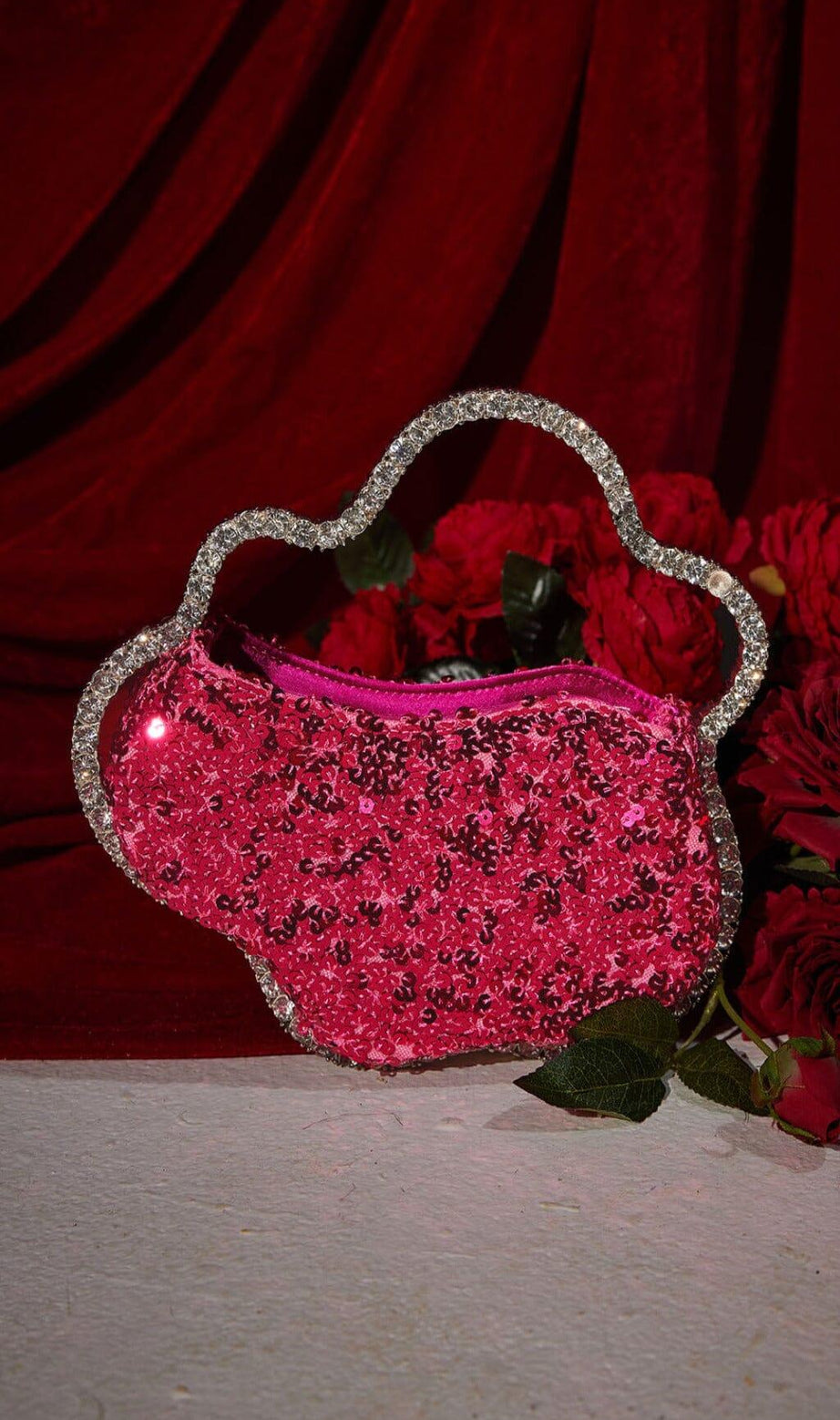SEQUIN CLOUD CLUTCH IN HOT PINK