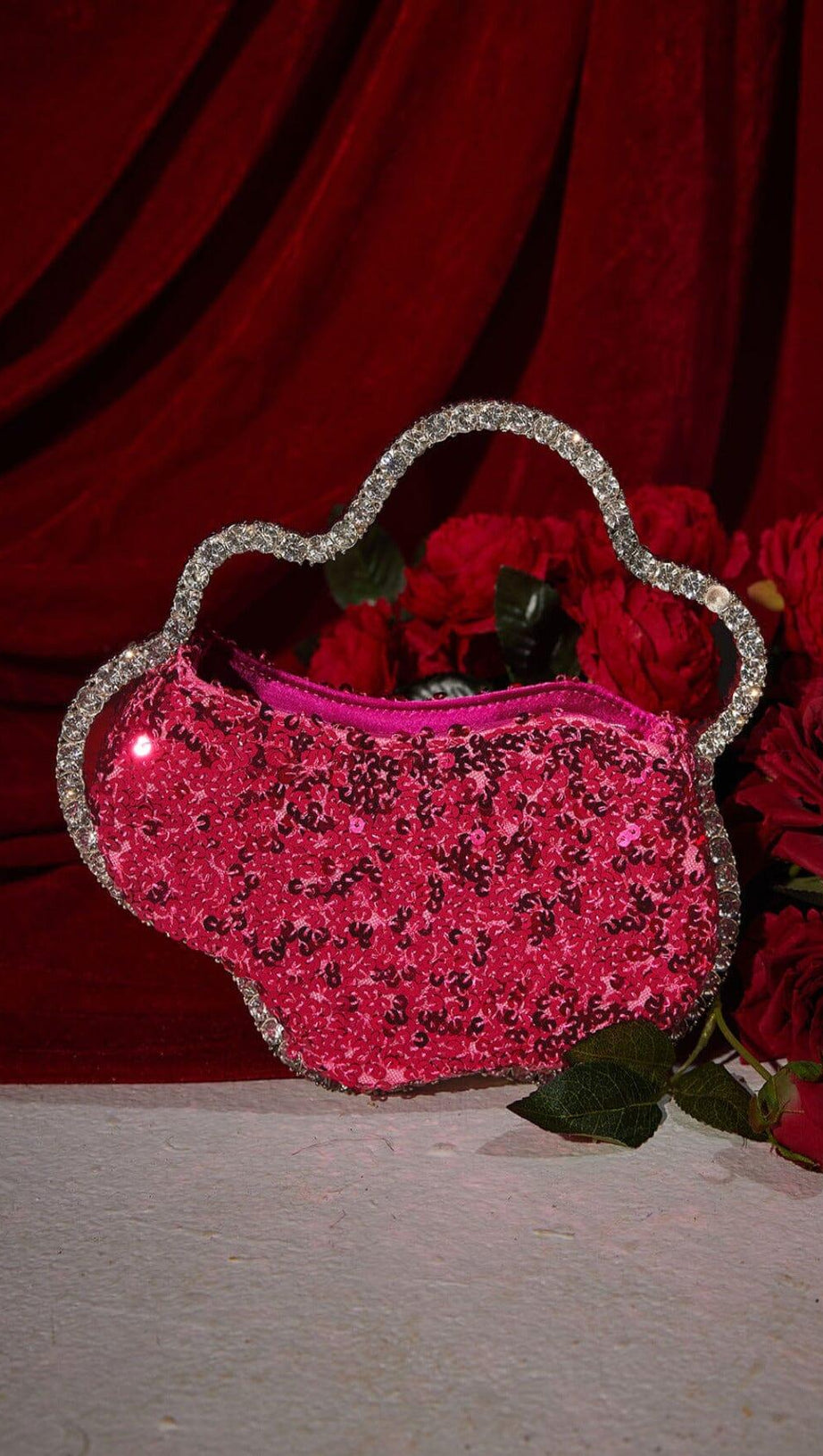 SEQUIN CLOUD CLUTCH IN HOT PINK