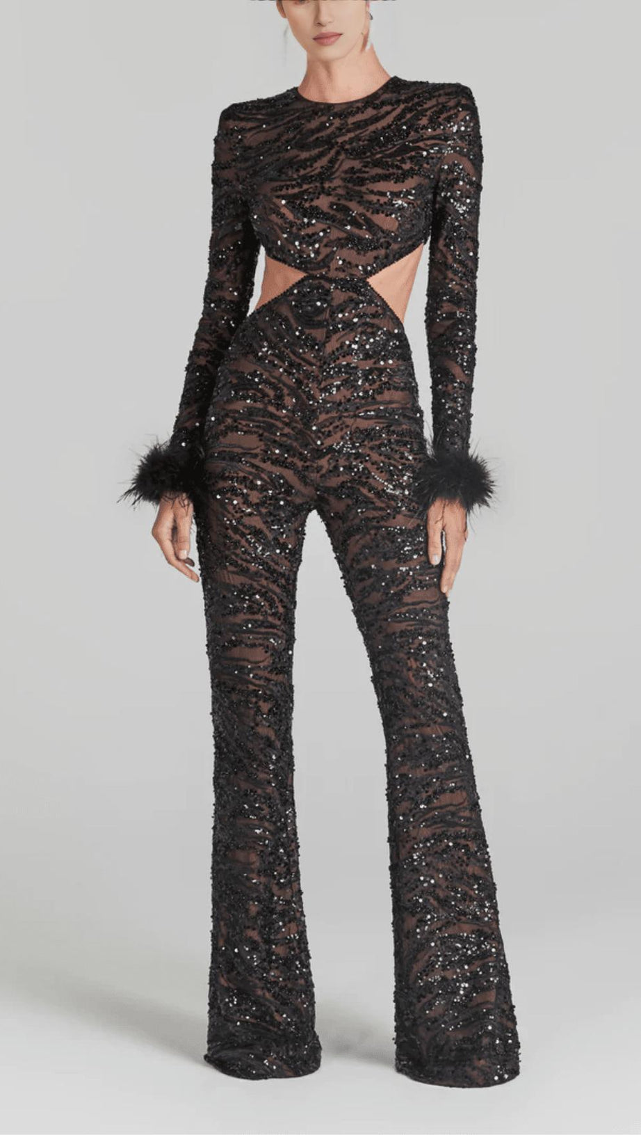 TUTA NERA SEXY CON PIUME E PAILLETTES SULLA SCHIENA