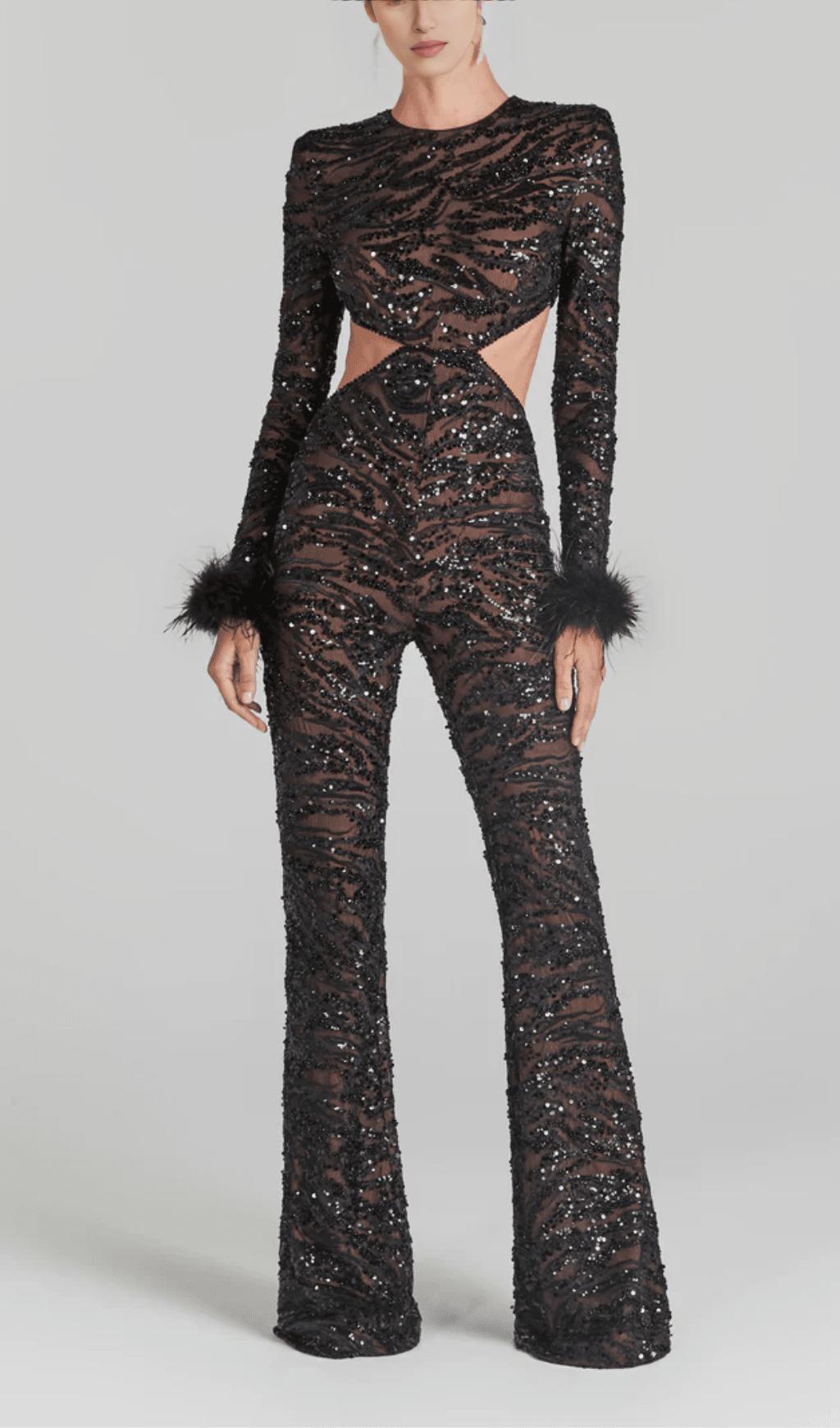 TUTA NERA SEXY CON PIUME E PAILLETTES SULLA SCHIENA