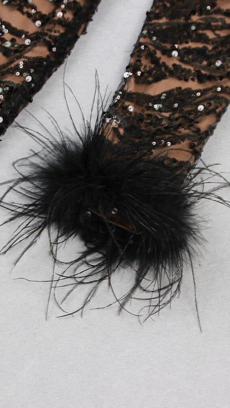 TUTA NERA SEXY CON PIUME E PAILLETTES SULLA SCHIENA