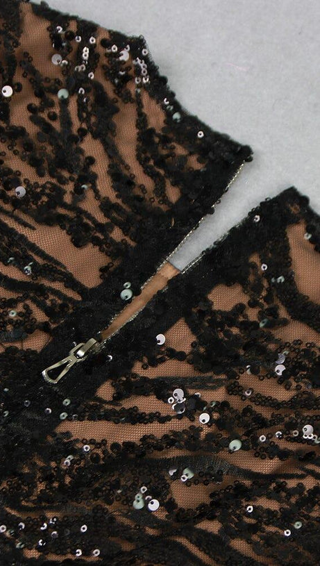 TUTA NERA SEXY CON PIUME E PAILLETTES SULLA SCHIENA