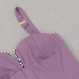 V NECK DIAMOND JUMPSUIT IN PURPLE