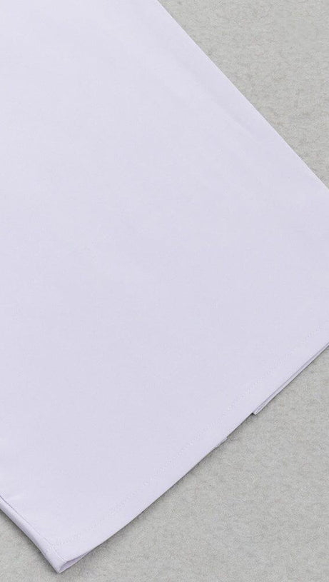 Tief ausgeschnittenes, enges MIDI-Kleid mit Rautenmuster und Rückenträgern