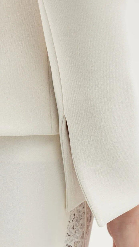 EMBROIDERED PEPLUM BLAZER IN WHITE