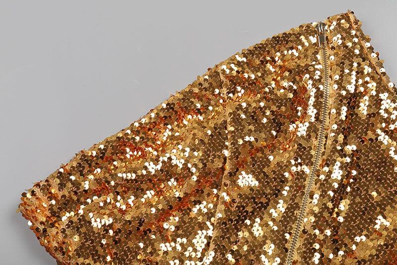 ABITO MIDI ASIMMETRICO SENZA SPALLINE CON PAILLETTES ORO 