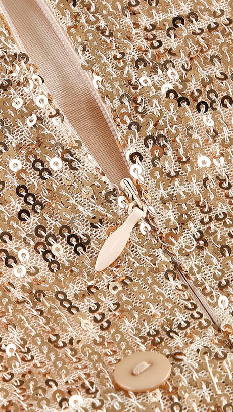 MINI ABITO CON FIOCCO SENZA SPALLINE ORO 