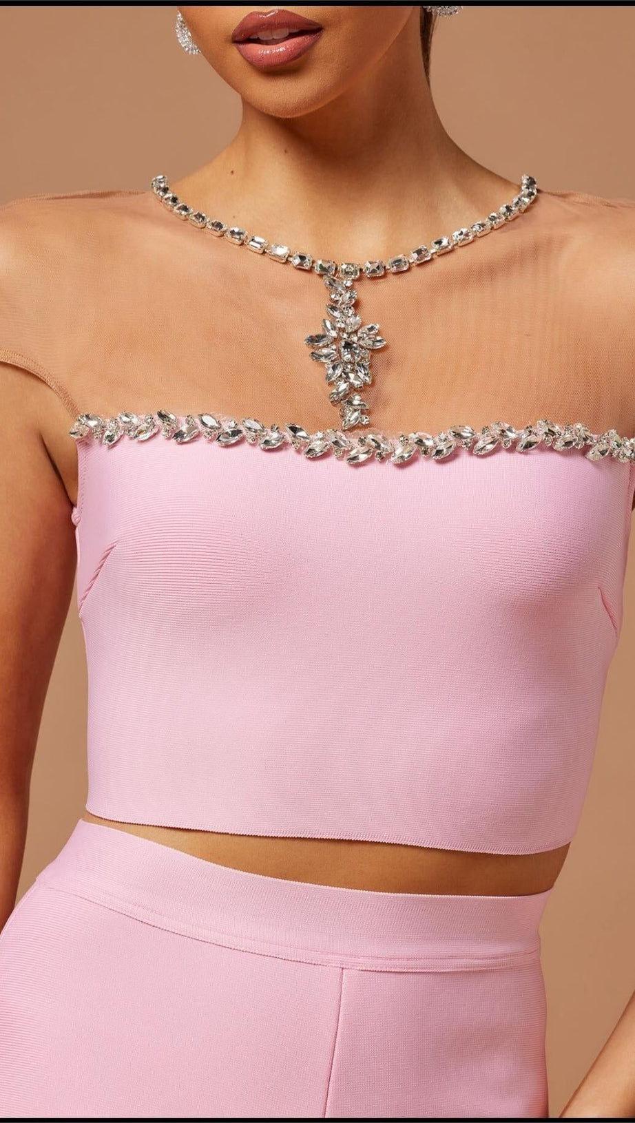 COMPLETO PANTALONI E TOP BANDAGE ROSA 