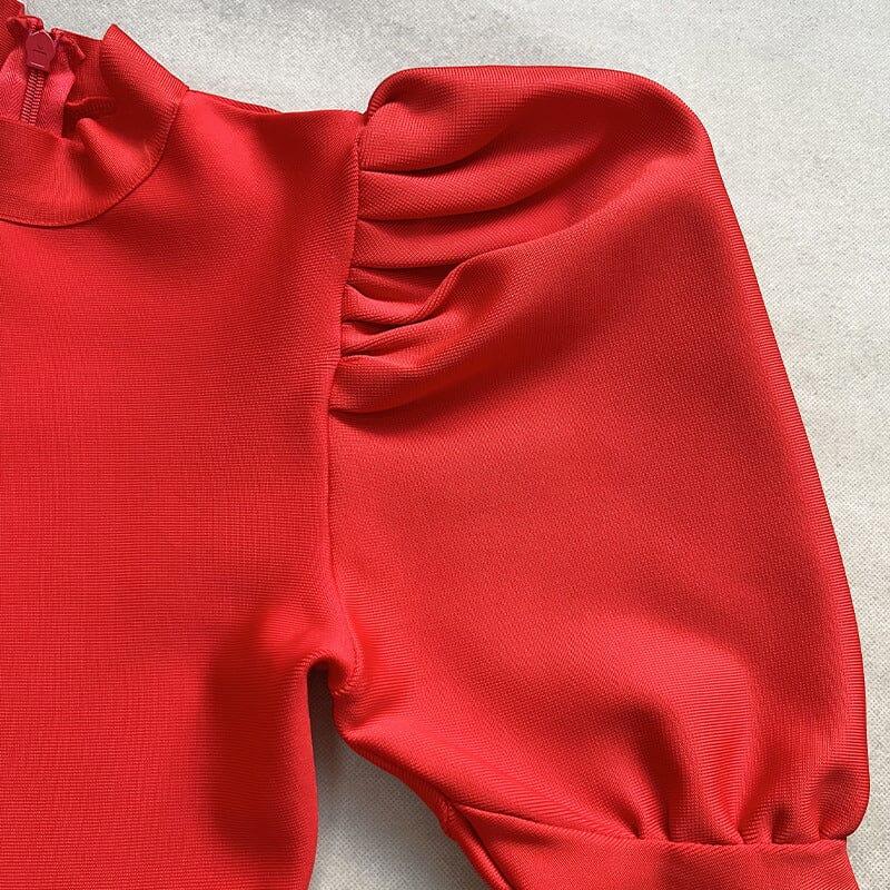 ABITO CON BENDAGGI IN PIUME DI CRISTALLO E MANICHE A SBUFFO