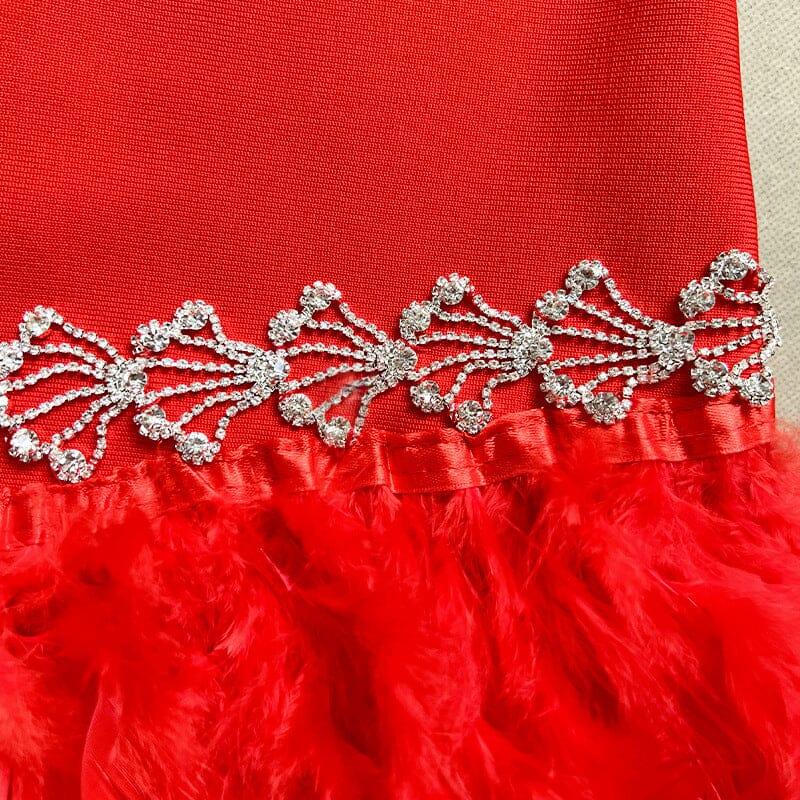 ABITO CON BENDAGGI IN PIUME DI CRISTALLO E MANICHE A SBUFFO