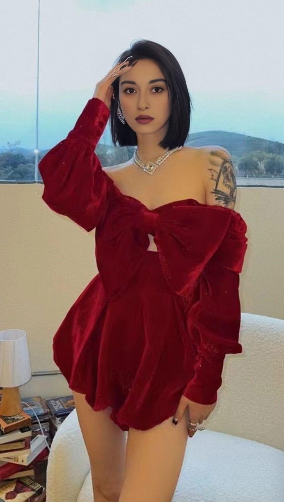 VELVET STRAPLESS JUMPSUIT IN RED