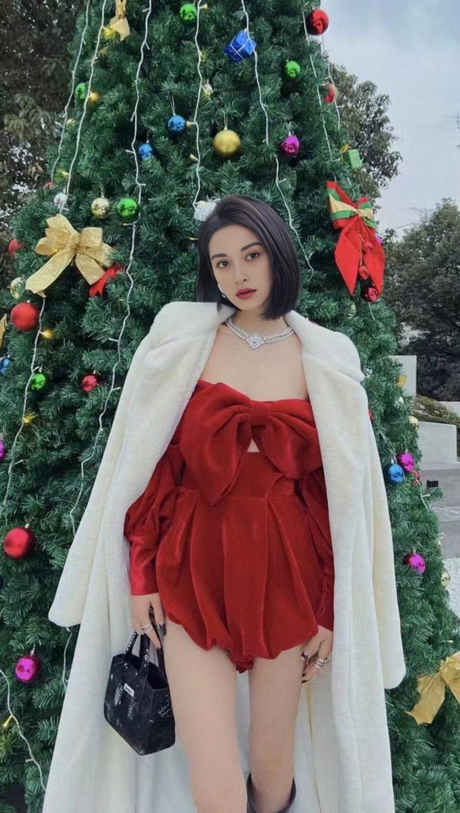 VELVET STRAPLESS JUMPSUIT IN RED