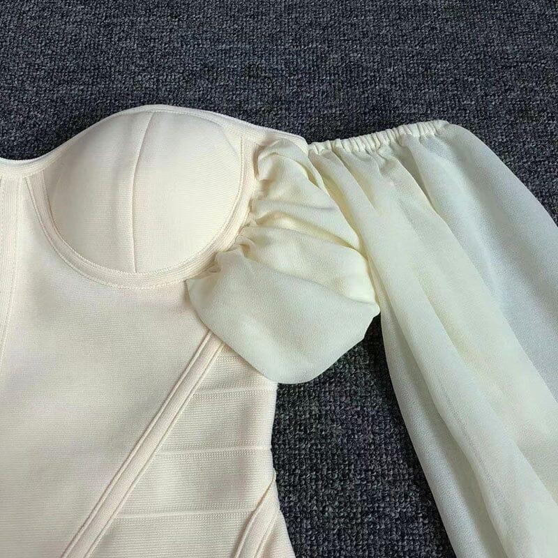 MINI ABITO SENZA SPALLINE CON BENDAGGI