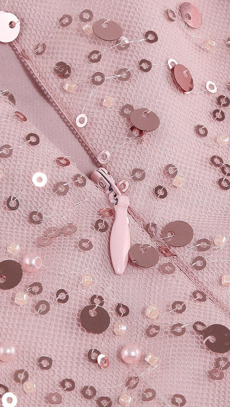ABITO CON PAILLETTES E PIUME ROSA