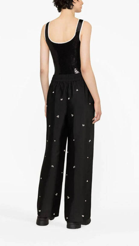 PANTALONI OVERSIZE IN TAFFETÀ DECORATI 