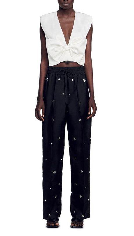 PANTALONI OVERSIZE IN TAFFETÀ DECORATI 