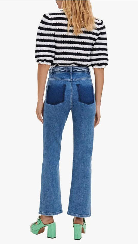 JEANS CON BORDI INTRECCIATI 