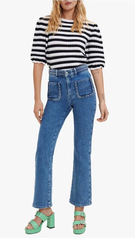 JEANS CON BORDI INTRECCIATI 